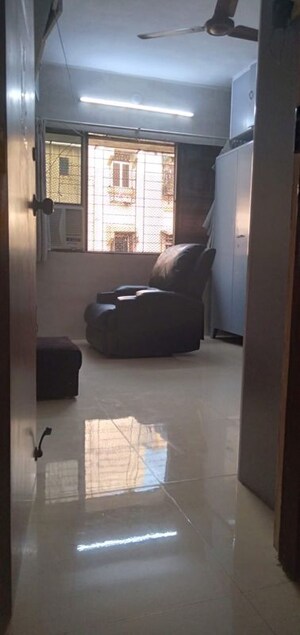 Living Room in 2 BHK Apartment at New Vijaya CHS, Malad West – for Rent