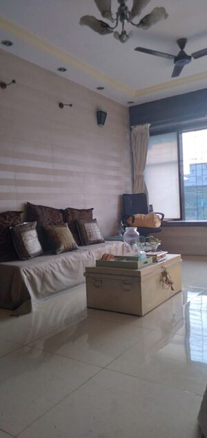 Living Room in 2 BHK Apartment at New Vijaya CHS, Malad West – for Rent