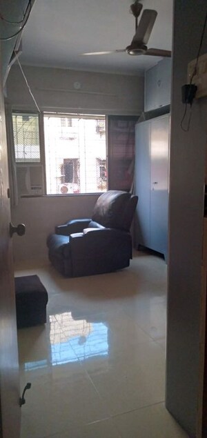 Living Room in 2 BHK Apartment at New Vijaya CHS, Malad West – for Rent
