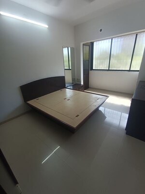 Room in 2 BHK Apartment at Landmark CHS Malad, Malad West – for Rent