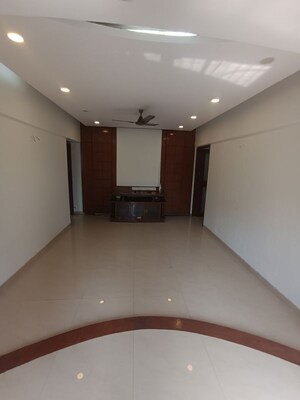 Living Room in 2 BHK Apartment at Landmark CHS Malad, Malad West – for Rent