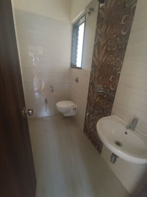 Bathroom in 2 BHK Apartment at Abrol Avirahi Heights, Malad West – for Rent