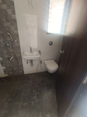 Bathroom in 2 BHK Apartment at Abrol Avirahi Heights, Malad West – for Rent