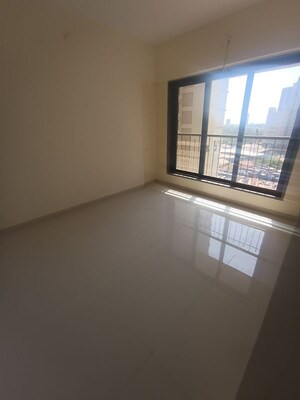 Room in 2 BHK Apartment at Abrol Avirahi Heights, Malad West – for Rent