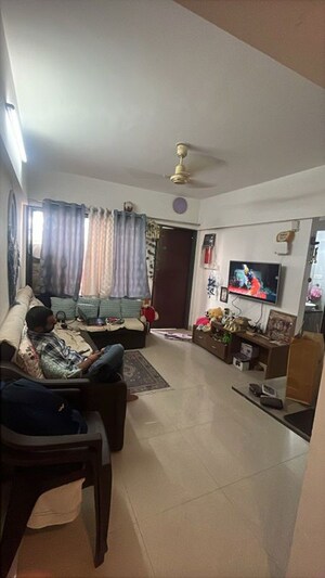 Living Room in 1 BHK Apartment at Atharva Altius Drome, Kharadi – for Rent