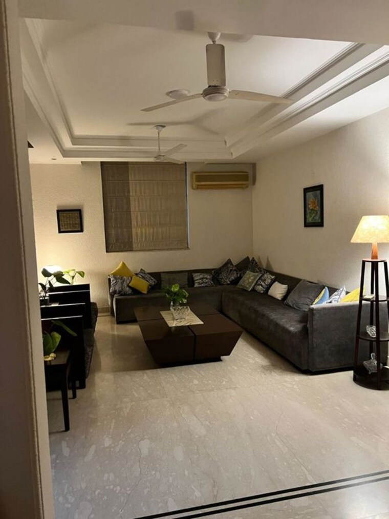Living Room, gulmohar park 4 Bedroom 400 Sq.Yd. Builder Floor In Gulmohar Park Delhi 10277796