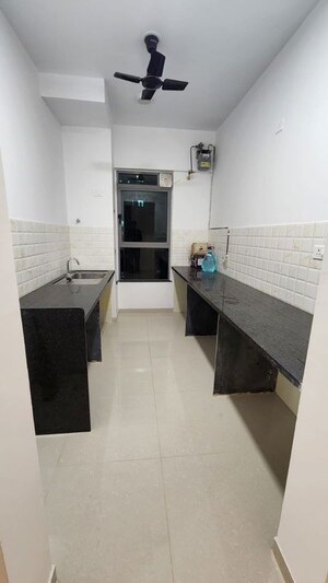 Kitchen in 2 BHK Apartment at Raymond Ten X Habitat, Pokhran Road No Two – for Rent