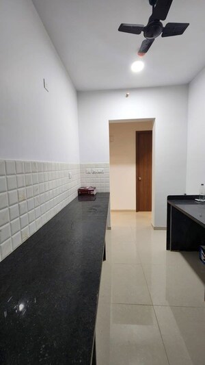 Kitchen in 2 BHK Apartment at Raymond Ten X Habitat, Pokhran Road No Two – for Rent