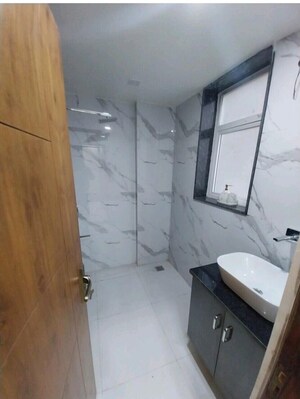 Bathroom in 2 BHK Apartment at KST Whispering Heights, Sector 88 – for Sale
