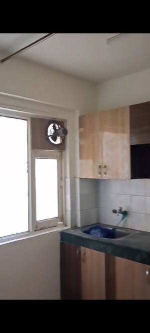 Kitchen in 2 BHK Apartment at ROF Aalayas, Sector 102 – for Rent