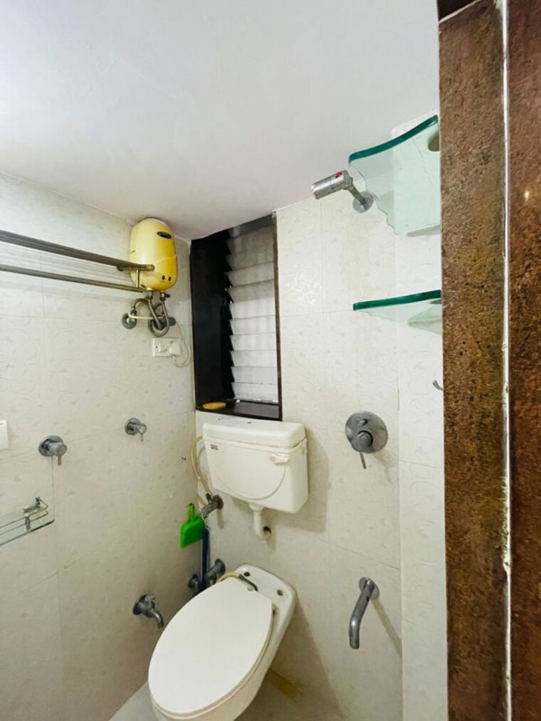 Bathroom, harmony-chs-goregaon-east 2 Bedroom 604 Sq.Ft. Apartment In Goregaon East Mumbai 10278256