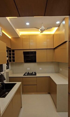 Kitchen in 3 BHK Apartment at Adani Oyster Grande Phase 2, Sector 102 – for Sale