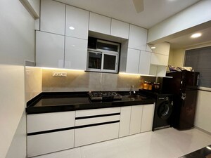 Kitchen in 2 BHK Apartment at Sanco Luxury Square, Chikhali – for Sale