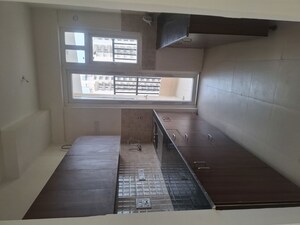 Kitchen in 3 BHK Penthouse at Amrapali Heartbeat City, Sector 107 – for Rent