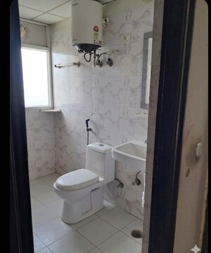 Bathroom in 3 BHK Apartment at Amrapali Heartbeat City, Sector 107 – for Rent
