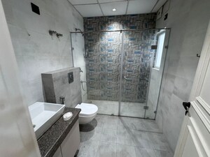 Bathroom in 3 BHK Apartment at Amrapali Heartbeat City, Sector 107 – for Rent