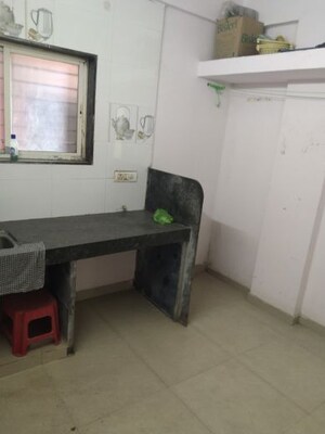 Kitchen in 3 BHK Apartment at Shri Senapati Bapat CHS, Senapati Bapat Road – for Rent