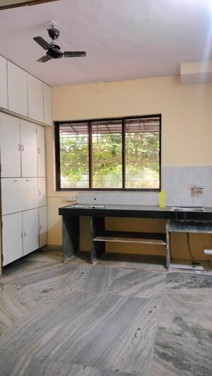 Kitchen in 1 BHK Apartment at Jumbo Darshan, Andheri East – for Rent