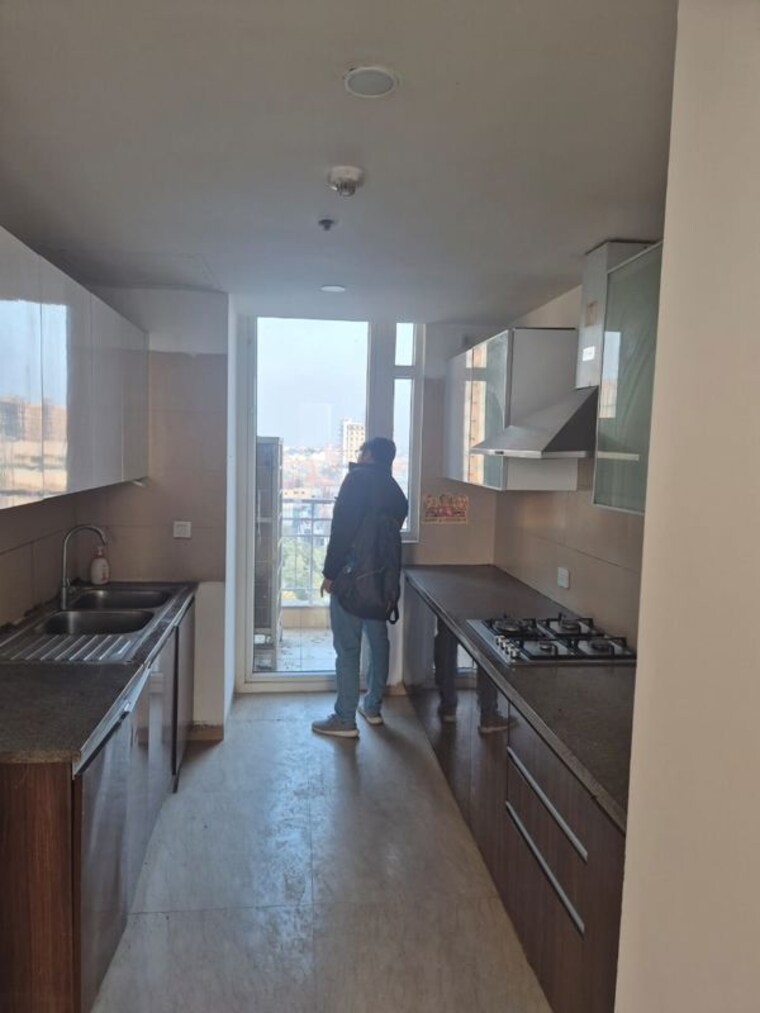 Kitchen, puri-diplomatic-greens-phase-i 3 Bedroom 1700 Sq.Ft. Apartment In Sector 111 Gurgaon 10278829
