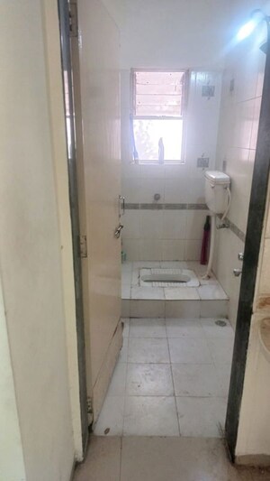 Bathroom in 2 BHK Apartment at Shubhashri Residency – for Rent