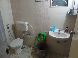 Bathroom in 3 BHK Apartment at Chandkheda – for Rent