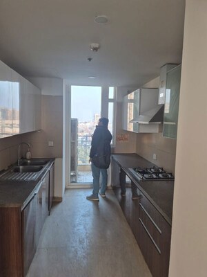 Kitchen in 3 BHK Apartment at Puri Diplomatic Greens Phase I, Sector 111 – for Rent