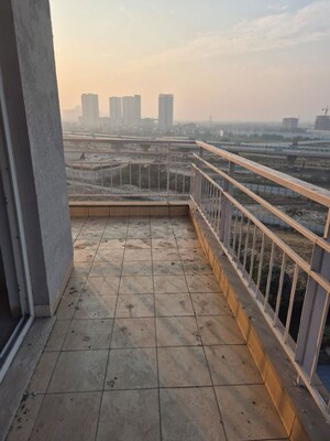 Balcony in 3.5 BHK Apartment at Puri Diplomatic Greens Phase I, Sector 111 – for Rent