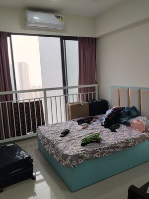 Bedroom in 2 BHK Apartment at Dynamix Divum, Malad East – for Rent