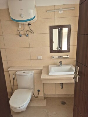 Bathroom in 4 BHK Apartment at Puri Diplomatic Greens Phase I, Sector 111 – for Sale
