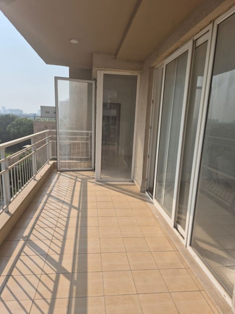 Balcony, puri-diplomatic-greens-phase-i 4 Bedroom 2950 Sq.Ft. Apartment In Sector 111 Gurgaon 10278952