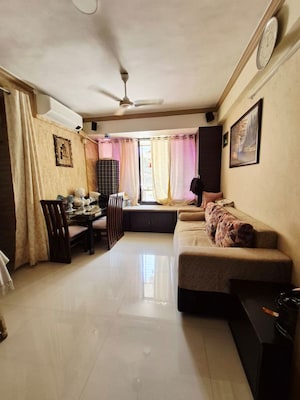 Living Room in 1 BHK Apartment at Evershine Insat CHS, Kandivali East – for Rent