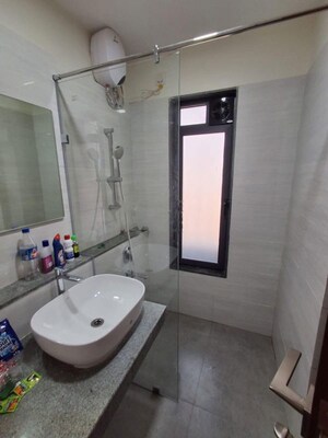Bathroom in 1 BHK Apartment at Dynamix Avanya, Dahisar East – for Rent