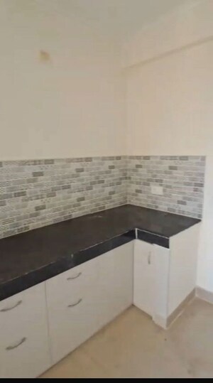 Kitchen in 2 BHK Apartment at Nilaya Greens, Raj Nagar Extension – for Rent