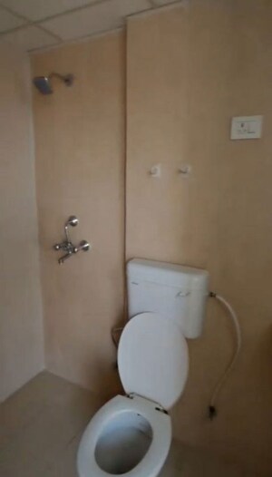 Bathroom in 2 BHK Apartment at Nilaya Greens, Raj Nagar Extension – for Rent