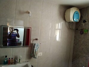 Bathroom in 3 BHK Apartment at Theme Ambience Golf View, Gachibowli – for Rent