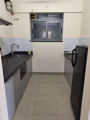 Kitchen in 1.5 BHK Apartment at Amanora Future Towers, Hadapsar – for Rent