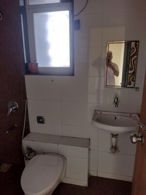 Bathroom in 1 BHK Apartment at Chavandai Residency II, Kalwa – for Rent