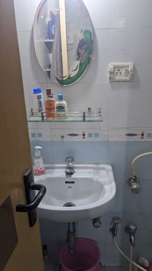 Bathroom in 2 BHK Apartment at Hubtown Akruti Orchid Park, Sakinaka – for Rent