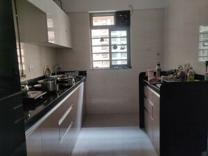 Kitchen in 2 BHK Apartment at Sheth Vasant Oasis, Andheri East – for Rent