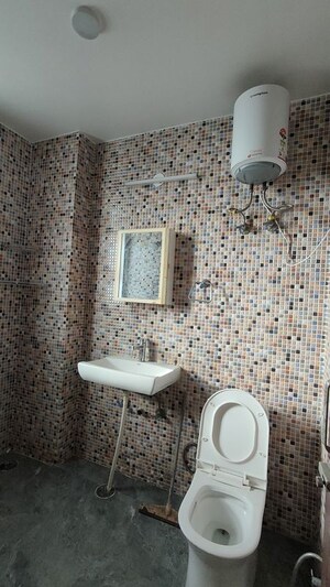 Bathroom in 3.5 BHK Builder Floor at Sector 52 – for Rent