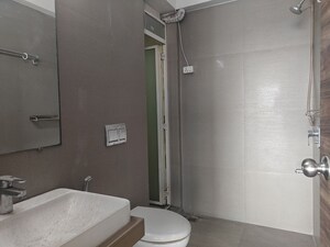 Bathroom in 3 BHK Apartment at Akshar Alvario, Seawoods – for Rent