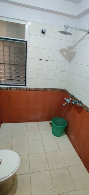 Bathroom in 2 BHK Apartment at Vaswani Golf Vista Orchid, Domlur – for Rent