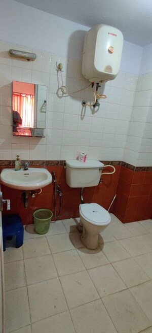 Bathroom in 2 BHK Apartment at Vaswani Golf Vista Orchid, Domlur – for Rent