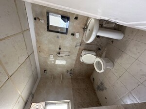 Bathroom in 3 BHK Apartment at Aims Golf City, Sector 75 – for Rent