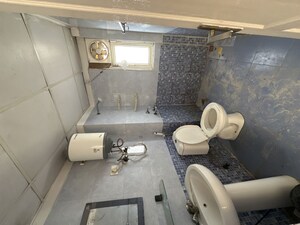 Bathroom in 3 BHK Apartment at Aims Golf City, Sector 75 – for Rent