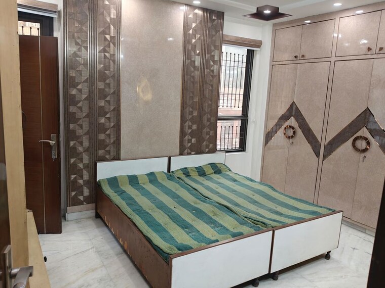 Bedroom, paschim vihar 3 Bedroom 125 Sq.Yd. Builder Floor In Paschim Vihar Delhi 10282327