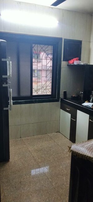 Kitchen in 1 BHK Apartment at Kalpataru Tower, Kalwa – for Sale