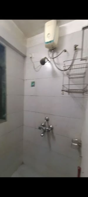Bathroom in 1 BHK Apartment at Tilak Nagar – for Rent