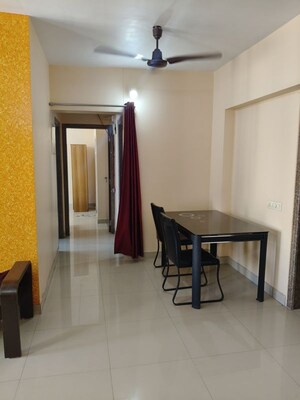 Living Room in 2 BHK Apartment at Kanakia Spaces Niharika, Manpada – for Rent