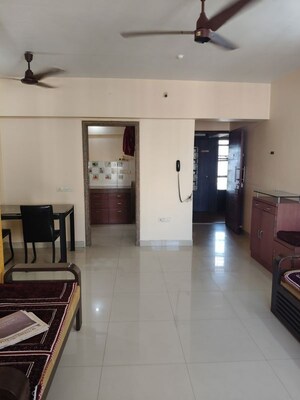 Living Room in 2 BHK Apartment at Kanakia Spaces Niharika, Manpada – for Rent
